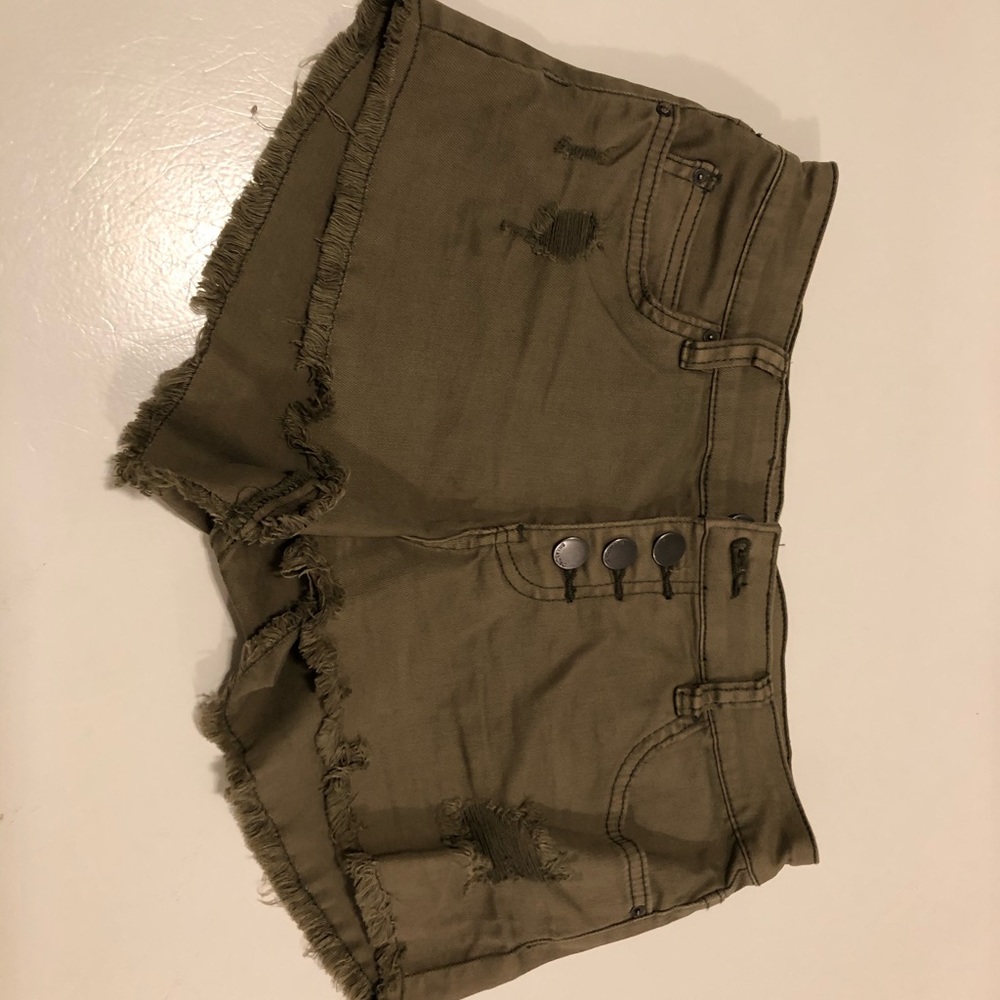 Dark green distressed shorts